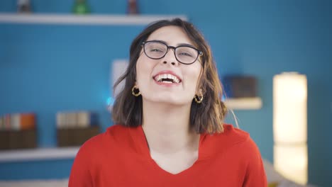Positive-happy-young-woman-laughing.